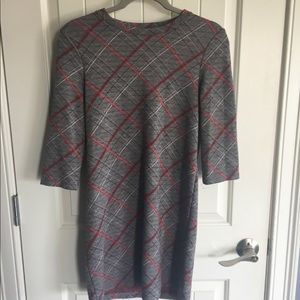 Zara’s plaid, stretchy mini dress.